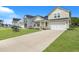 Two-story house with a two-car garage and landscaped yard at 516 Yellow Leaf Ln, Summerville, SC 29486