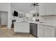 Modern kitchen with white cabinets, stainless steel appliances, and quartz countertops at 516 Yellow Leaf Ln, Summerville, SC 29486