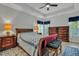 Spacious bedroom with sleigh bed, two dressers, and ceiling fan at 516 Yellow Leaf Ln, Summerville, SC 29486