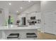 Open concept kitchen with white cabinets, quartz counters and stainless steel appliances at 516 Yellow Leaf Ln, Summerville, SC 29486