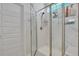 Clean shower with glass enclosure and marble tile at 516 Yellow Leaf Ln, Summerville, SC 29486