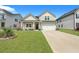 Two-story home with a landscaped yard and driveway at 516 Yellow Leaf Ln, Summerville, SC 29486