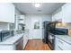 Modern kitchen featuring granite countertops and black appliances at 2355 Cambridge Ave, North Charleston, SC 29405