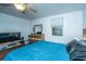 Spacious bedroom with large TV and dresser at 2355 Cambridge Ave, North Charleston, SC 29405
