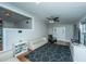 Spacious living room with light walls and a geometric rug at 2355 Cambridge Ave, North Charleston, SC 29405