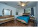 Main bedroom with wood floors and stylish dresser at 2355 Cambridge Ave, North Charleston, SC 29405