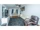 Spacious living room with light walls and a geometric rug at 2355 Cambridge Ave, North Charleston, SC 29405