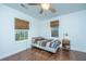 Bright bedroom with wood floors, ceiling fan, and window coverings at 2355 Cambridge Ave, North Charleston, SC 29405