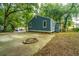 Cozy backyard with fire pit and ample space at 2355 Cambridge Ave, North Charleston, SC 29405
