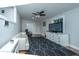 Spacious living room with light walls and a geometric rug at 2355 Cambridge Ave, North Charleston, SC 29405