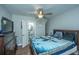 Bedroom with en-suite bathroom and ceiling fan at 2355 Cambridge Ave, North Charleston, SC 29405