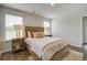 Well-lit bedroom with wood floors and ample natural light at 2332 Macallan Blvd, Ravenel, SC 29470