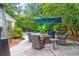 Relaxing patio with fire pit and seating area near pool at 1094 Honeysuckle Ln, Charleston, SC 29412