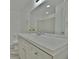 Modern bathroom with white vanity and a large mirror at 840 Brittlebank Rd, Walterboro, SC 29488