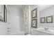 Clean bathroom with a shower/tub combo and white vanity at 5528 Bowmore Blvd, Ravenel, SC 29470