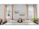 Bright dining area with large windows, and stylish decor at 5528 Bowmore Blvd, Ravenel, SC 29470