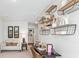 Loft area with a desk, seating, and built-in shelving at 5528 Bowmore Blvd, Ravenel, SC 29470