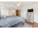 Bright bedroom featuring hardwood floors and a dresser at 108 N Norfolk Way, Goose Creek, SC 29445