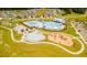 Community pool, playground and homes aerial view at 830 Lilyford Ln, Summerville, SC 29486