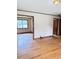 Spacious living room featuring hardwood floors and neutral walls at 318 Pine Needle Rd, Walterboro, SC 29488