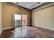 Spacious loft bedroom with exposed ductwork and large window at 150 Bee Street # 614, Charleston, SC 29401