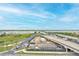 Aerial view showcasing the property's location near a bridge and waterway at 150 Bee Street # 614, Charleston, SC 29401