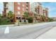 Brick building with palm trees and street parking at 150 Bee Street # 614, Charleston, SC 29401