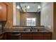 Kitchen with granite countertops, stainless steel sink and dishwasher at 150 Bee Street # 614, Charleston, SC 29401