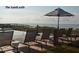 Relaxing poolside view at The Sandcastle with ocean backdrop at 4282 Mariners Watch, Kiawah Island, SC 29455