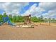 playground with slides, swings, and a sandbox at 515 Alderly Dr, Moncks Corner, SC 29461