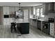 Modern kitchen with stainless steel appliances and large island at 928 Tiger Loop, Saint Stephen, SC 29479