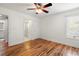 Bright bedroom with hardwood floors, ceiling fan, and en-suite bathroom at 1616 Live Oak Park, Seabrook Island, SC 29455