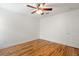 Simple bedroom with hardwood floors, ceiling fan and a closet at 1616 Live Oak Park, Seabrook Island, SC 29455