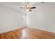 Well-lit bedroom featuring hardwood floors and ceiling fan at 1616 Live Oak Park, Seabrook Island, SC 29455