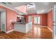 Open kitchen with granite countertops, stainless steel appliances, and hardwood floors at 1616 Live Oak Park, Seabrook Island, SC 29455