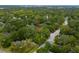 Aerial view of the property, situated amongst a neighborhood of houses and greenery at 3981 Niagara St, North Charleston, SC 29405