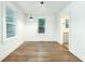 Dining room with hardwood floors and pendant light at 3981 Niagara St, North Charleston, SC 29405