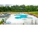 Community pool with multiple areas, lounge chairs, and cabana at 168 Yarrow Way, Moncks Corner, SC 29461