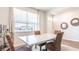 Dining room with large window and view of community at 183 Morning View Way, Moncks Corner, SC 29461