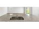 Granite countertop kitchen island with double sink at 183 Morning View Way, Moncks Corner, SC 29461