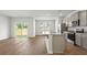 Kitchen with gray cabinets, stainless steel appliances, and an island at 183 Morning View Way, Moncks Corner, SC 29461