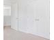 Bedroom with double door closet and access to loft area at 369 Willows Crescent Dr, Moncks Corner, SC 29461