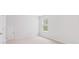 Spacious bedroom with neutral wall color, carpeting, and a window with blinds at 369 Willows Crescent Dr, Moncks Corner, SC 29461