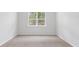 Bright bedroom with neutral walls and carpeting at 369 Willows Crescent Dr, Moncks Corner, SC 29461