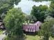 Brick house with metal roof, large porch, and waterfront view at 1813 Albert Storm Ave, Moncks Corner, SC 29461