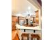 Kitchen features hardwood floors, an island, and stainless steel appliances at 1813 Albert Storm Ave, Moncks Corner, SC 29461