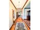Bright entryway with hardwood floors, chandelier, and access to living areas at 1813 Albert Storm Ave, Moncks Corner, SC 29461