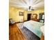 Main bedroom with hardwood floors, ceiling fan, and plenty of natural light at 1813 Albert Storm Ave, Moncks Corner, SC 29461