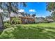 Two-story brick house with front porch and yard at 1813 Albert Storm Ave, Moncks Corner, SC 29461