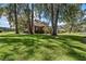 Brick house exterior with lush landscaping and trees at 1813 Albert Storm Ave, Moncks Corner, SC 29461